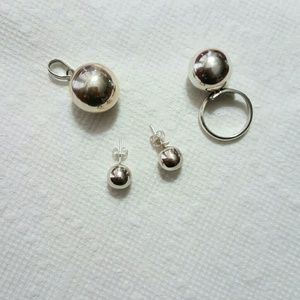 Harmony Ball chime Sterl Ring & Pendent, earning